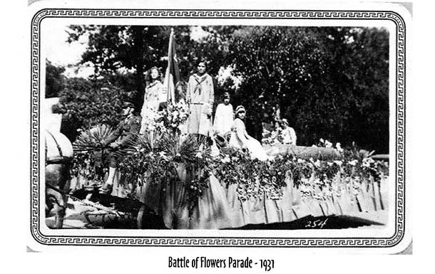 1930s image of girl scouts in the battle of flowers parade