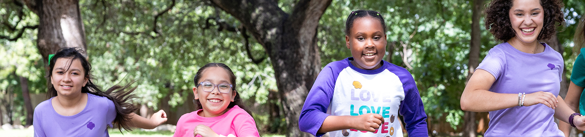  Three Girl Scouts smiling together 