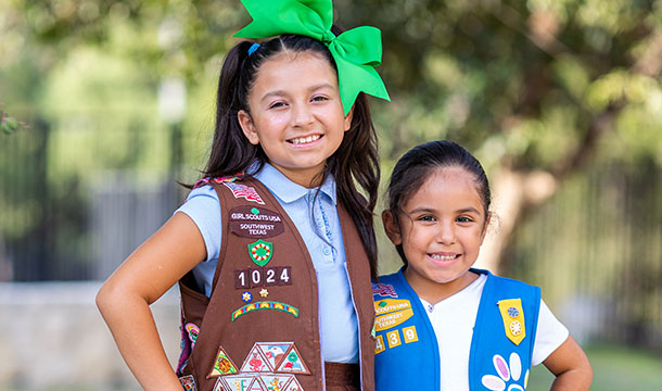 two young girl scouts in uniform