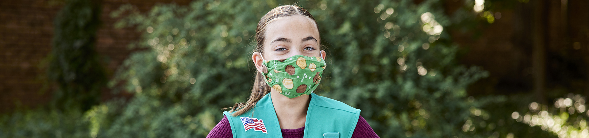  Girl Scout with a mask on 